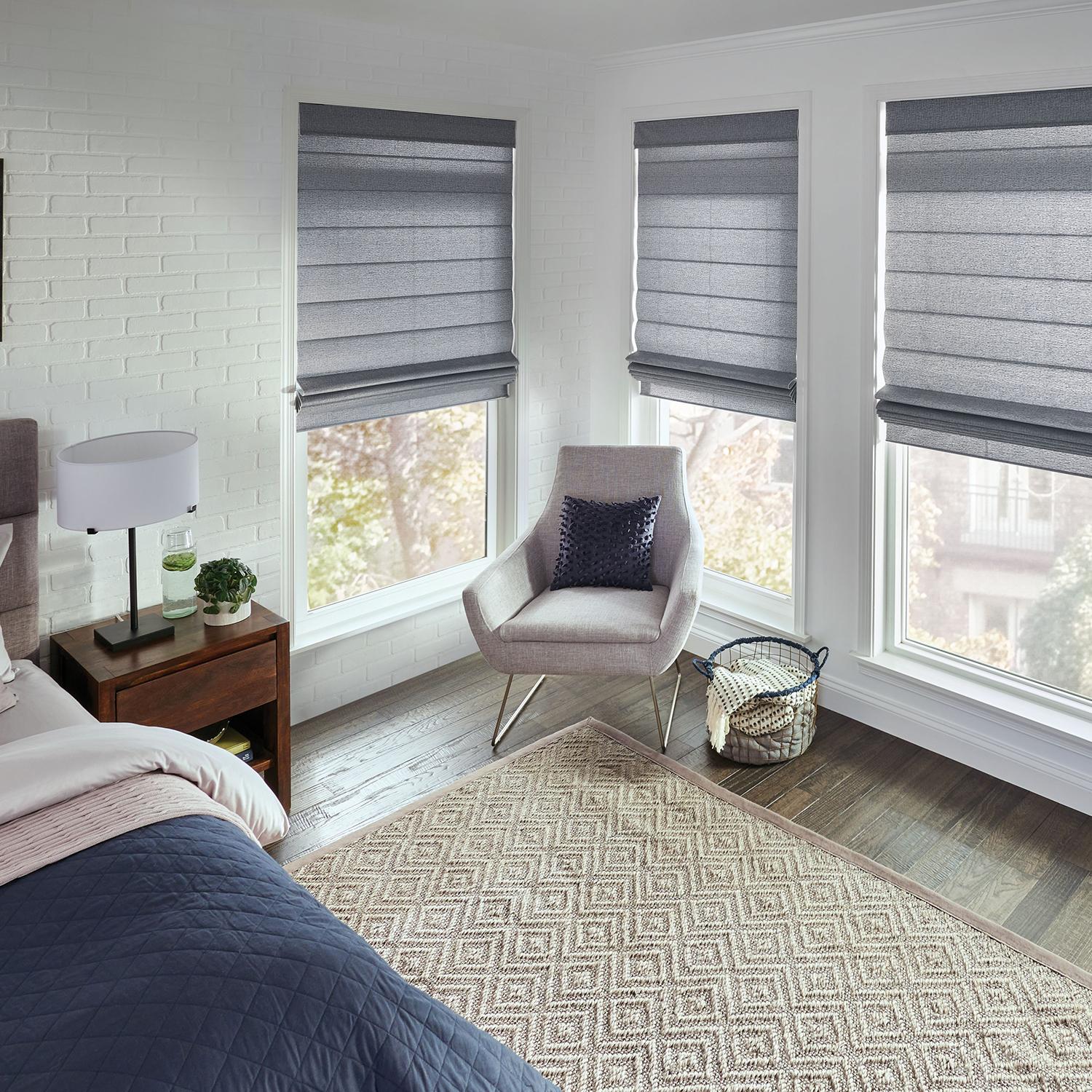 Roman Shades Roman Shades in a bedroom window
