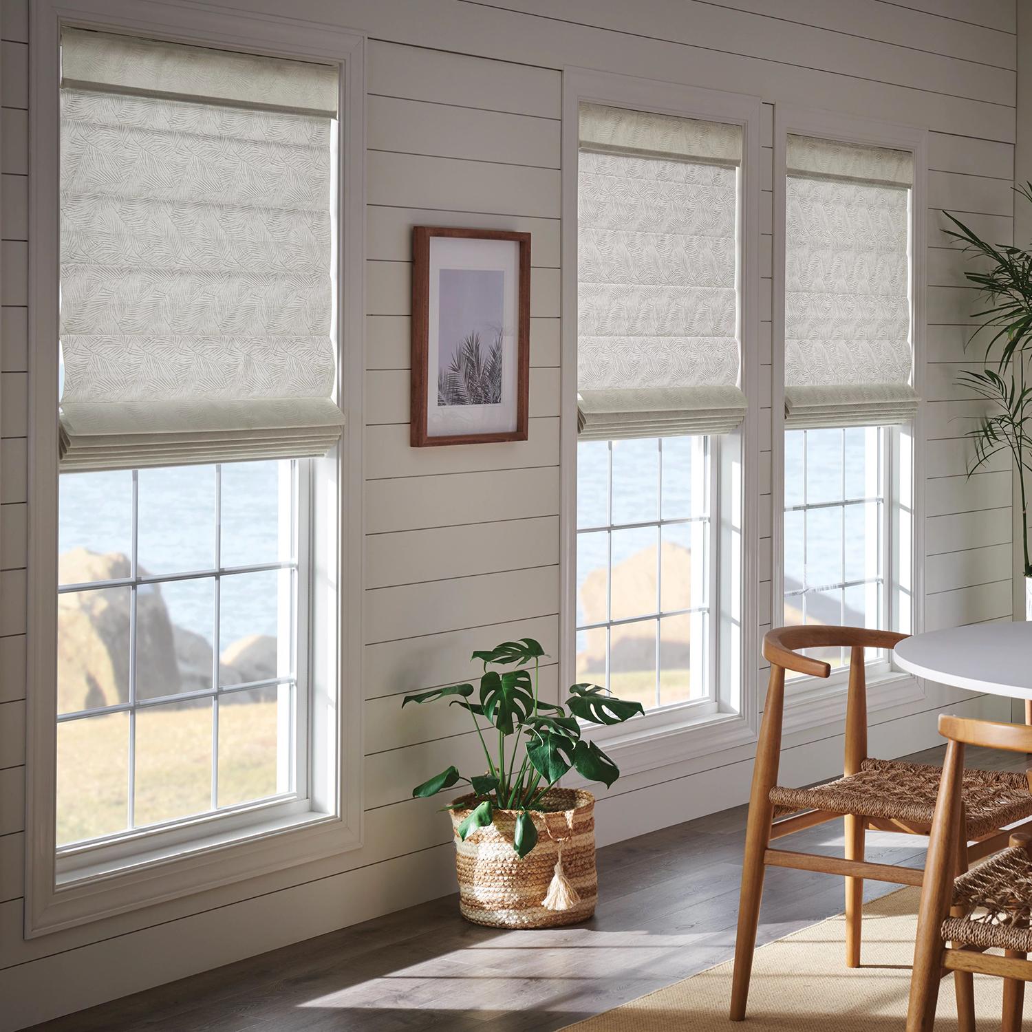 Roman Shades Roman Shades in a dining room window